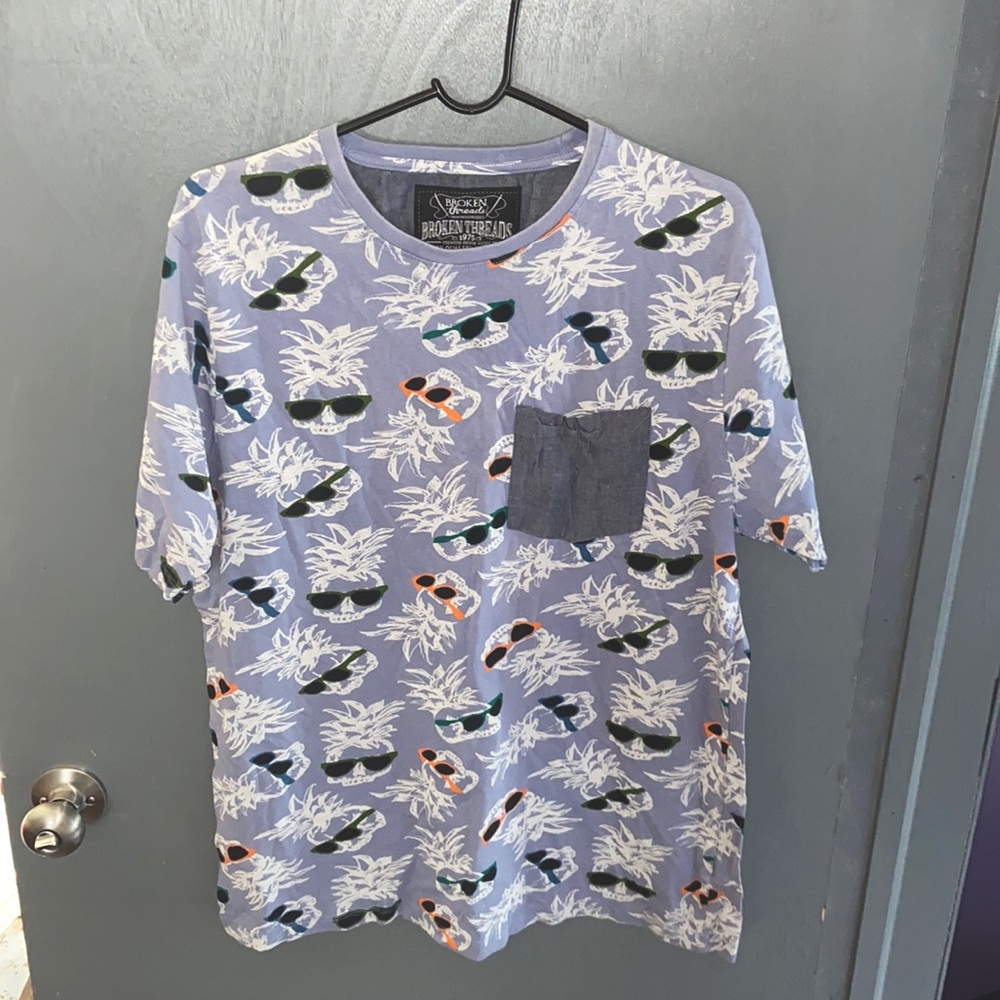 pineapple with sunglasses t-shirt size is a XL